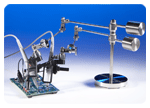 The N2784A and N2785A one- and two-arm probe positioners provide quick and stable X-Y positioning using a simple “lift and drop” motion to set the probe in place.