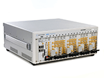 Angled shot including cabling: The M9381A is made up of 4 modules: M9311A digital vector modulator, M9310A source output, M9301A synthesizer and M9300A frequency reference. 